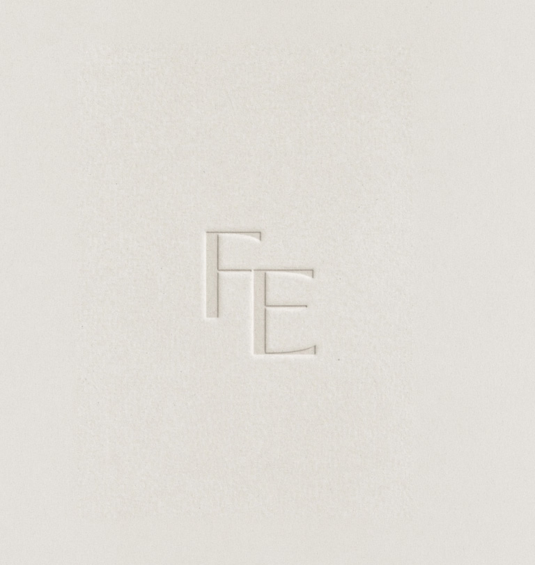 Embossed FE monogram on The Finance Edit business card